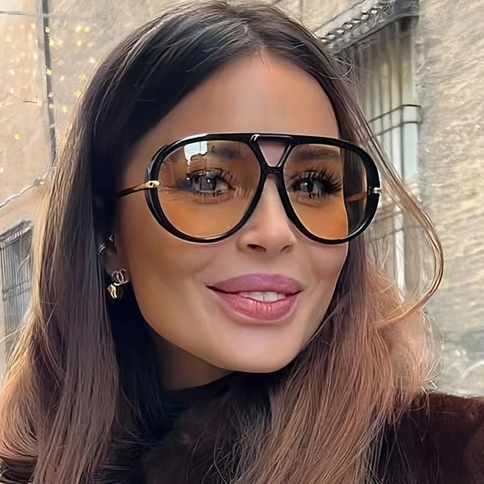 نظارة شمسية نسائية بيضاوية كبيرة — إطار معدني كلاسيكي